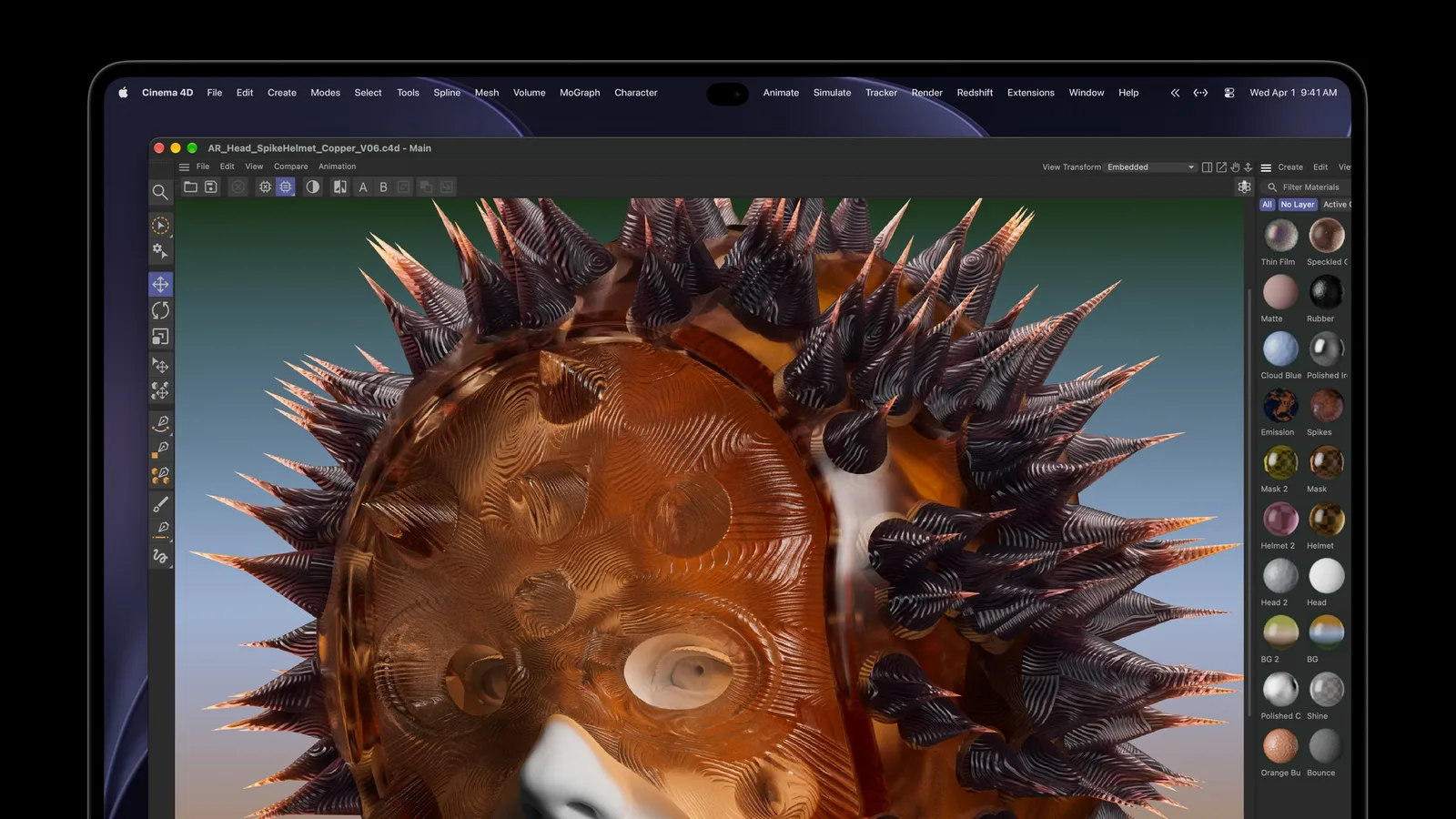Le MacBook Pro affiche une sculpture 3D colorée dans le logiciel Cinema 4D