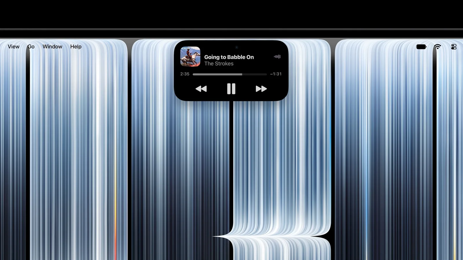 Gros plan sur la Dynamic Island en haut de l'écran du MacBook Pro, avec un morceau en lecture